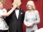 Just Stop Oil protesters throw custard pie at King Charles waxwork at Madame Tussauds.