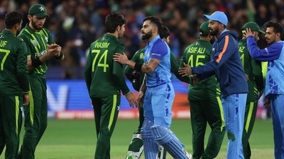 India's Virat Kohli shakes hands with Pakistan's Mohammad Wasim following the T20 World Cup match (AP) India's Virat Kohli shakes hands with Pakistan's Mohammad Wasim following the T20 World Cup match (AP)