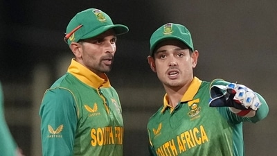 South Africa's Keshav Maharaj, left, chats with Quinton de Kock during a match (AP)