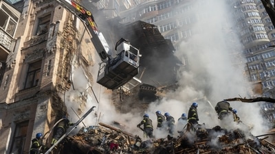 Russia-Ukraine War: Firefighters work after a drone attack on buildings in Kyiv, Ukraine. (AP) Russia-Ukraine War: Firefighters work after a drone attack on buildings in Kyiv, Ukraine. (AP)