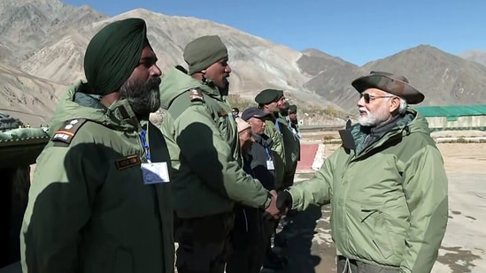Prime Minister Narendra Modi on Monday celebrated Diwali with the soldiers in Kargil and said that the Festival of Lights mean the "festival of end of terror" and that Kargil had made it possible.`(ANI)