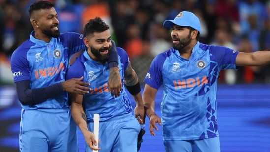 Virat Kohli, center, with teammates after winning their T20 World Cup cricket match against Pakistan.(AP) Virat Kohli, center, with teammates after winning their T20 World Cup cricket match against Pakistan.(AP)
