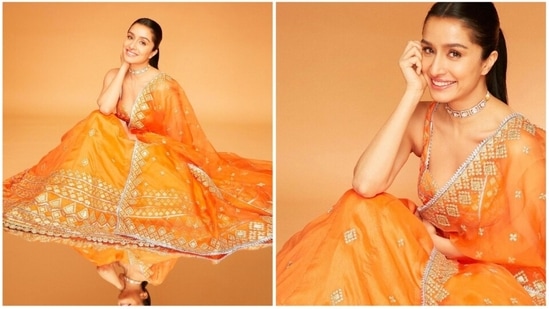 Shraddha Kapoor, in an orange saree, looked like a dream. She shared her stills on her Instagram handle and captioned it, "Diwali saal mein 3 baar kyun nahi ho sakti??? Happy Diwali!!!."(Instagram/@shraddhakapoor)