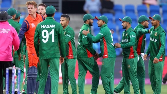 Bangladesh players celebrate their win after the T20 World Cup 2022 match between Bangladesh and Netherlands at Bellerive Oval in Hobart on October 24, 2022.(AFP)