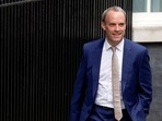 Dominic Raab walks outside Number 10 Downing Street, in London. (REUTERS)
