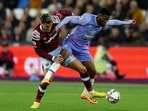 West Ham's Gianluca Scamacca, left, challenges Bournemouth's Jefferson Lerma during their English Premier League match West Ham's Gianluca Scamacca, left, challenges Bournemouth's Jefferson Lerma during their English Premier League match