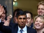 New leader of the Britain's Conservative Party Rishi Sunak walks outside the Conservative Campaign Headquarters on Monday. New leader of the Britain's Conservative Party Rishi Sunak walks outside the Conservative Campaign Headquarters on Monday.