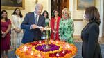 US President Joe Biden lights a lamp as First lady Jill Biden and Vice-President Kamala Harris look on during an event to celebrate Diwali, at the White House in Washington. (PTI) US President Joe Biden lights a lamp as First lady Jill Biden and Vice-President Kamala Harris look on during an event to celebrate Diwali, at the White House in Washington. (PTI)