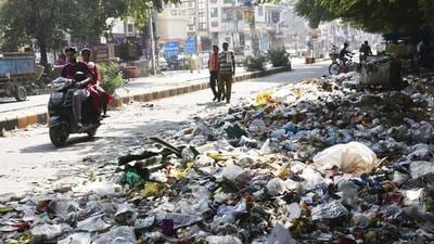 Garbage is spilled all over Madanpuri road in Gurugram on Tuesday. (Vipin Kumar/HT Photo) Garbage is spilled all over Madanpuri road in Gurugram on Tuesday. (Vipin Kumar/HT Photo)
