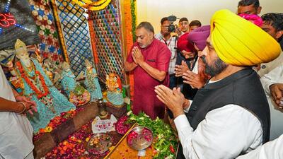 Punjab chief minister Bhagwant Maan pays tribute to Lord Vishwakarma during a state-level function in Ludhiana on Tuesday. (PTI)