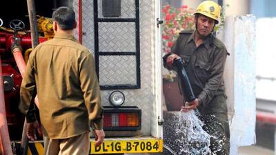 Firefighters fighting a blaze in New Delhi. (AFP file) Firefighters fighting a blaze in New Delhi. (AFP file)