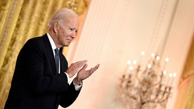 US President Joe Biden claps as he hosts a reception to celebrate Diwali. (AFP)