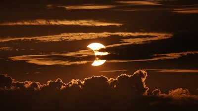 A partial solar eclipse will be seen on Tuesday afternoon in India. (Julio Cortez / AP)