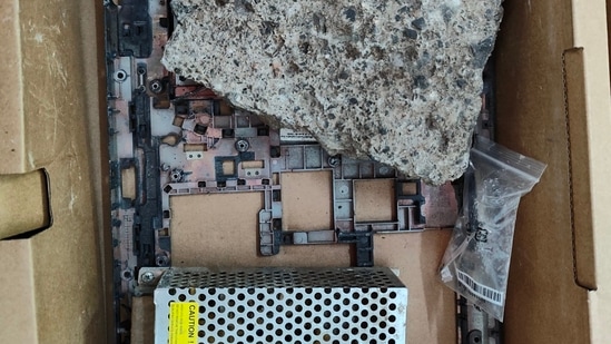 Upon opening the box, instead of a gaming laptop, stones and garbage were found. (Chinmaya Ramana/Twitter) Upon opening the box, instead of a gaming laptop, stones and garbage were found. (Chinmaya Ramana/Twitter)