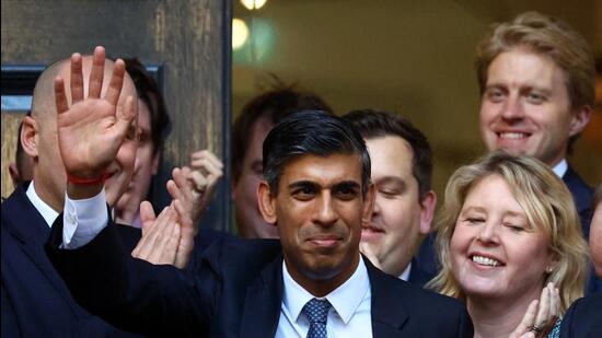New leader of the Britain's Conservative Party Rishi Sunak walks outside the Conservative Campaign Headquarters on Monday. (REUTERS)