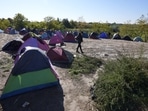 A migrant walks through a makeshift camp near a border line between Serbia and Hungary, near village of Horgos, Serbia. Located at the heart of the so-called Balkan route, Serbia recently has seen a sharp rise in arrivals of migrants passing through the country in search of a better future in the West. A migrant walks through a makeshift camp near a border line between Serbia and Hungary, near village of Horgos, Serbia. Located at the heart of the so-called Balkan route, Serbia recently has seen a sharp rise in arrivals of migrants passing through the country in search of a better future in the West.