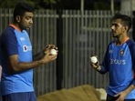 Ravichandran Ashwin, left, speaks with Yuzvendra Chahal.(AP) Ravichandran Ashwin, left, speaks with Yuzvendra Chahal.(AP)