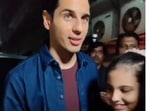 Sidharth Malhotra posing with a young fan named Kiara at Thank God screening. Sidharth Malhotra posing with a young fan named Kiara at Thank God screening.