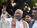 Newly elected Indian National Congress (INC) president Mallikarjun Kharge shows the victory sign at his Rajaji Marg residence, in New Delhi, India, on Wednesday, 