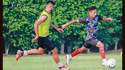 Players in action during the match between Minerva Academy and Dalbir Football Academy at the PU ground on Wednesday. (HT Photo)