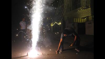 Even though the Chandigarh administration had allowed bursting of crackers only on Diwali night, residents across the city were seen indulging in fireworks on Tuesday too. (Keshav Singh/HT)