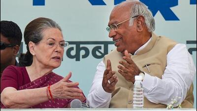 Congress president Mallikarjun Kharge with Sonia Gandhi at the AICC headquarters in New Delhi on Wednesday. (PTI Photo)