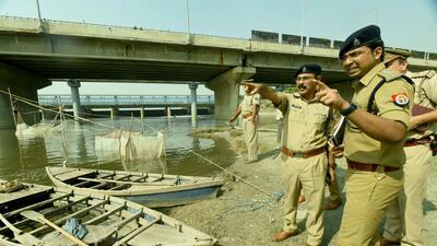 ACP Ashutosh Dwivedi and Noida Police survey the Yamuna bank at Okhla barrage where a special Chhath Ghat will be built. (Sunil Ghosh/HT Phot) ACP Ashutosh Dwivedi and Noida Police survey the Yamuna bank at Okhla barrage where a special Chhath Ghat will be built. (Sunil Ghosh/HT Phot)