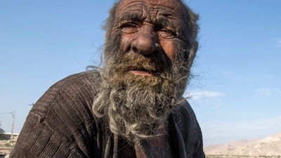 World's Dirtiest Man: Amou Haji (uncle Haji) sits on the outskirts of the village of Dezhgah. (AFP)