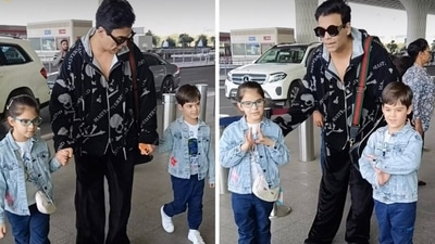 Karan Johar with Yash and Roohi at Mumbai airport. Karan Johar with Yash and Roohi at Mumbai airport.