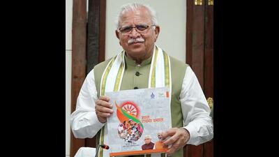 Haryana CM Manohar Lal Khattar releases the book on the completion of eight years of his tenure in the state, at Haryana Bhavan, in New Delhi on Wednesday. (ANI) Haryana CM Manohar Lal Khattar releases the book on the completion of eight years of his tenure in the state, at Haryana Bhavan, in New Delhi on Wednesday. (ANI)