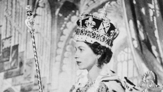 (FILES) In this file photo taken on June 2, 1953 Queen Elizabeth II of Great Britain poses on her Coronation day, in London. - The coronation of King Charles III will take place on May 6, 2023, Buckingham Palace announced on October 11, 2022. The Crown Jewels will form the centrepiece of King Charles III's coronation, and symbolise the power and history of the British monarchy. (Photo by INTERCONTINENTALE / AFP)(AFP)