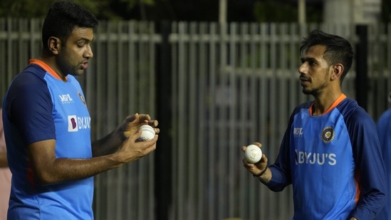 Ravichandran Ashwin, left, speaks with Yuzvendra Chahal.(AP)