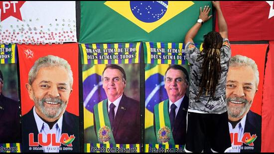 The two candidates vying to become Brazil’s next president – Bolsonaro and ex-president Luiz Luiz Inácio “Lula” da Silva – are in a no-holds-barred contest for the elections scheduled on October 30. The campaigns have become exceedingly personal, accompanied by a barrage of fake news. (AFP)