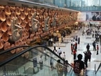 Passengers arrive in the new, integrated Terminal 3 of the IGI Airport.