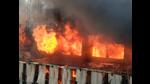 Fire raging at a liquor factory in Industrial Area, Phase 1, Chandigarh on Thursday. The blaze is suspected to have been caused by a short-circuit during a motor’s repair. (Keshav Singh/HT) Fire raging at a liquor factory in Industrial Area, Phase 1, Chandigarh on Thursday. The blaze is suspected to have been caused by a short-circuit during a motor’s repair. (Keshav Singh/HT)