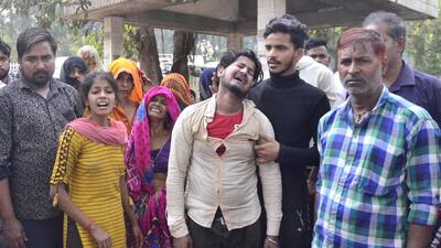 Grieving relatives of the youth found dead on railway tracks in Ludhiana on Thursday. (Harvinder Singh/Hindustan Times)