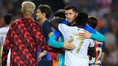 Robert Lewandowski hugs Sadio Mane (AFP) Robert Lewandowski hugs Sadio Mane (AFP)