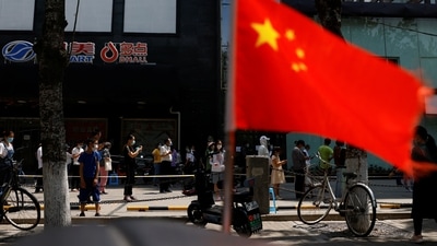 China's Illegal Police Stations In Netherlands: A China's flag flutters. (Reuters)