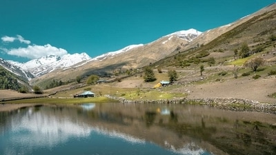 The picturesque home of Sangla, also known as the Baspa Valley or Sangla Valley, is situated in the Kinnaur district of Himachal Pradesh. It is surrounded by lush forests of pine trees, majestic Himalayan mountains, vibrant orchards of apples and apricots, and exquisitely constructed low lying houses. This picturesque town is everything a lover of nature could possibly want: tranquil and serene. (Unsplash) The picturesque home of Sangla, also known as the Baspa Valley or Sangla Valley, is situated in the Kinnaur district of Himachal Pradesh. It is surrounded by lush forests of pine trees, majestic Himalayan mountains, vibrant orchards of apples and apricots, and exquisitely constructed low lying houses. This picturesque town is everything a lover of nature could possibly want: tranquil and serene. (Unsplash)