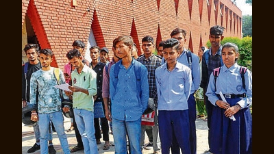 Students protesting outside the district education officer’s office in Sector 19, Chandigarh, on Thursday. (Keshav SIngh/HT)