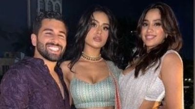 Janhvi Kapoor smiled as she posed with Nysa Devgan and Orhan Awatramani. While Nysa opted for a green lehenga, Janhvi draped a white saree. Instagram/Orhan Awatramani 