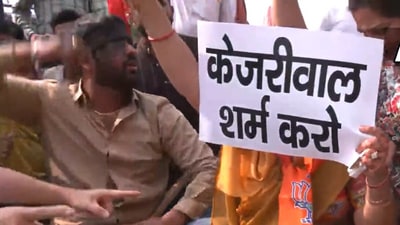 BJP workers protest against the AAP government in Delhi. (ANI videograb) BJP workers protest against the AAP government in Delhi. (ANI videograb)