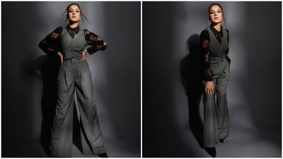 Shehnaaz's ensemble is from the shelves of the clothing label Deme by Arjun Rampal's girlfriend, Gabriella Demetriades. It features a waistcoat and high-waisted pants in a charcoal grey shade, teamed with a black lace shirt. (Instagram) Shehnaaz's ensemble is from the shelves of the clothing label Deme by Arjun Rampal's girlfriend, Gabriella Demetriades. It features a waistcoat and high-waisted pants in a charcoal grey shade, teamed with a black lace shirt. (Instagram)