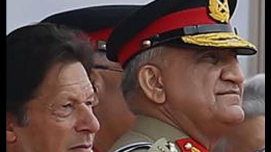 The first half of General Qamar Bajwa’s tenure saw the marginalisation of Nawaz Sharif; the closing part of it has seen a reversal of that policy and Imran Khan as the target (AP)