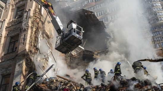 Russia-Ukraine War: Firefighters work after a drone attack on buildings in Kyiv, Ukraine.(AP) Russia-Ukraine War: Firefighters work after a drone attack on buildings in Kyiv, Ukraine.(AP)