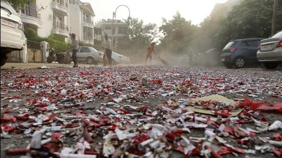 Gurgaon, India - Oct. 24, 2014: After Diwali celebration, the streets of Gurgaon continued to be filled up with the residue of crackers burnt on Diwali, in Gurgaon, India, on Friday, October 24, 2014. (Photo by Sanjeev Verma/ Hindustan Times) (Hindustan Times)