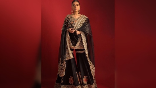 Aditi Rao Hydari's sharara set features hand embroidery in vintage zari and floral scenic motifs.(Instagram/@manishmalhotra)