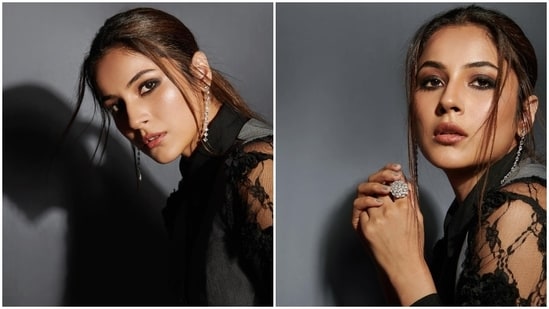 For the accessories, Shehnaaz picked dangling single-strand earrings, black pointed leather boots with killer high heels, and embellished statement rings. A centre-parted messy ponytail rounded off her hairdo. (Instagram)