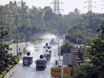 Mobile anti-smog guns spray water on the roads after flag-off by Delhi Environment Minister Gopal Rai to control air pollution. (ANI file) Mobile anti-smog guns spray water on the roads after flag-off by Delhi Environment Minister Gopal Rai to control air pollution. (ANI file)