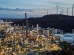 FILE - Wind turbines turn on top of a dump next to the 'BP Refinery Scholven' in Gelsenkirchen, Germany,(AP) FILE - Wind turbines turn on top of a dump next to the 'BP Refinery Scholven' in Gelsenkirchen, Germany,(AP)